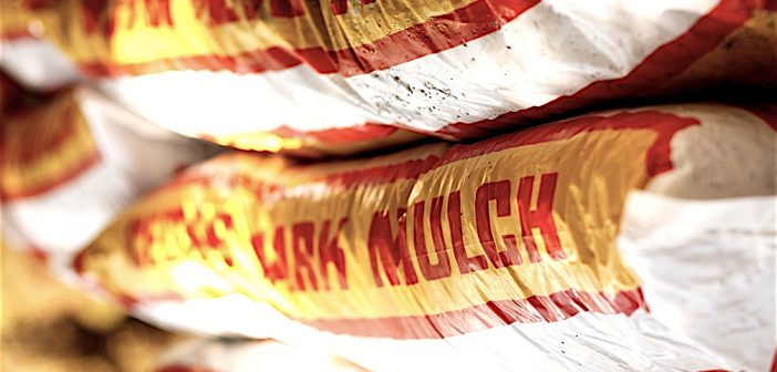 Image of stacked bags of mulch.